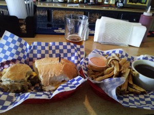 The Beam's Burger Dip -- a pair of patties with sauteed onions, fries with fry sauce, and au jus for dipping.